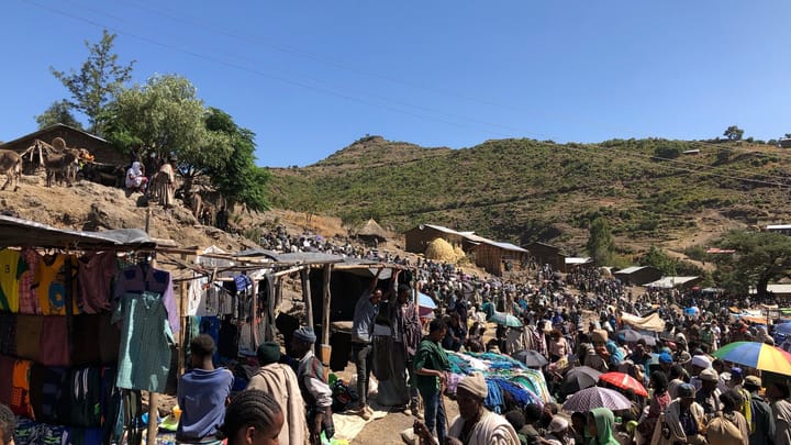 A crowded hillside market near Lalibela, Ethiopia