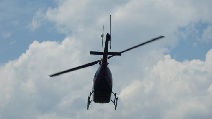 A helicopter flying overhead in Mayrhofen, Austria